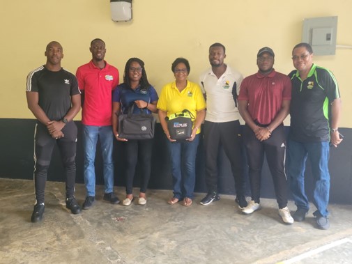 Jamaica Volleyball Association receives a donation to safeguard their athletes